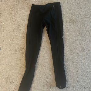 Black puma leggings. With see through hem on the side